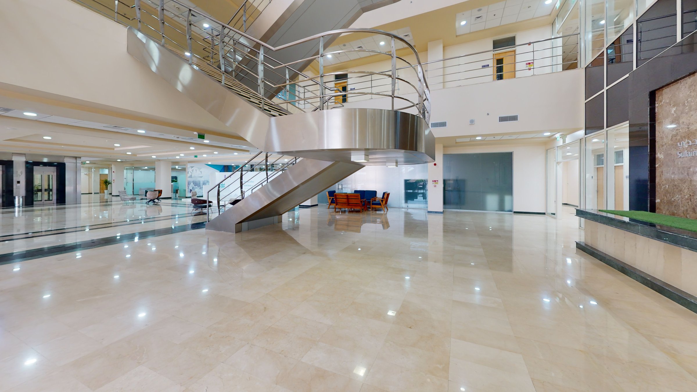 Main atrium and feature staircase at Sulaiman Al Rajhi University, captured in a Matterport 3D virtual tour